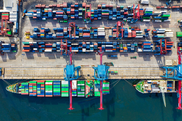 Top view of port with cargo ship